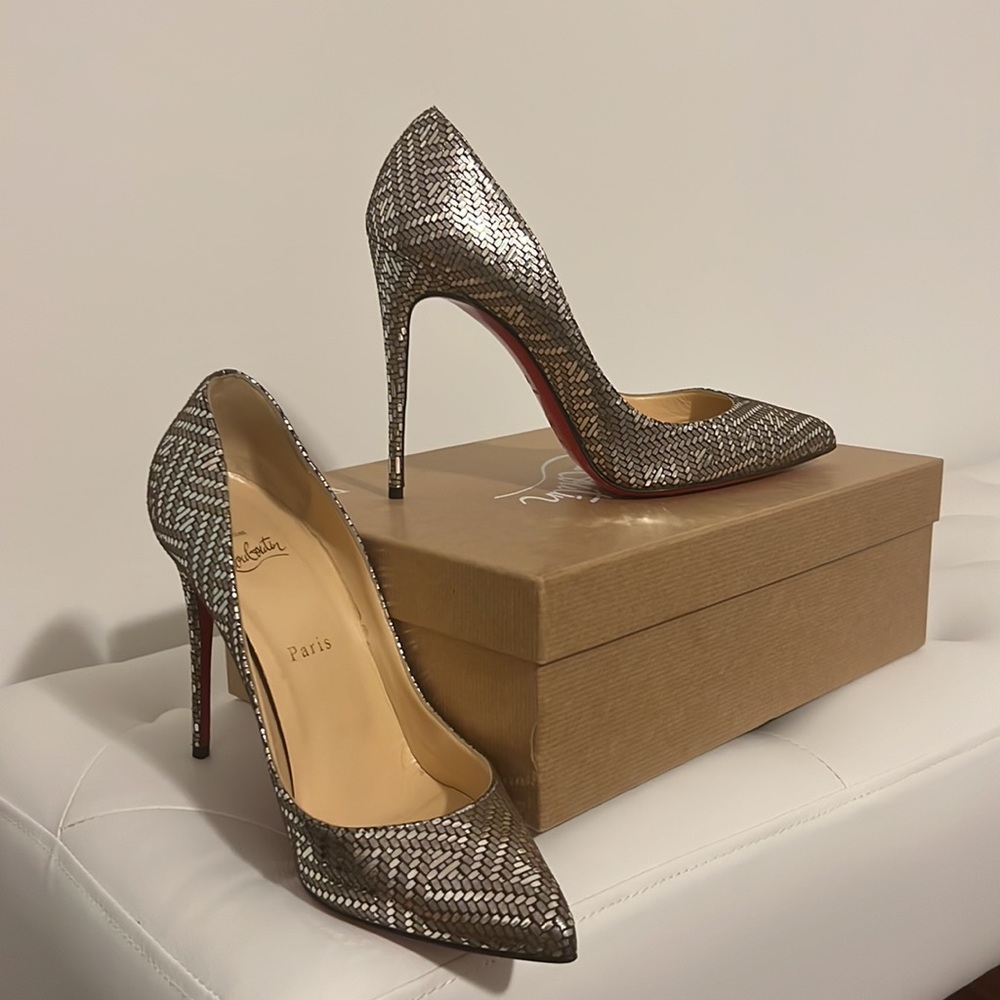 Christian Louboutin Silver Heels.